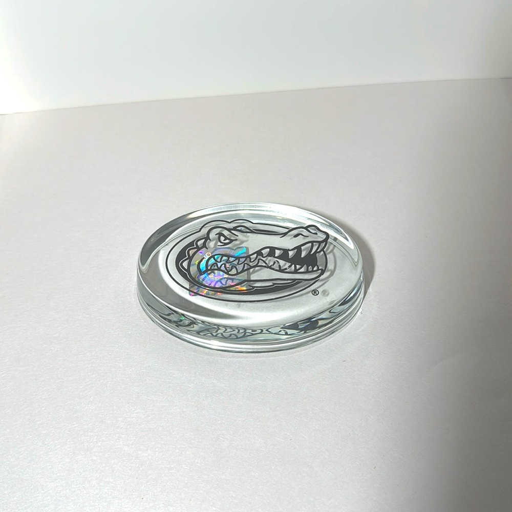 Officially Licensed Collegiate Products Florida Gators Oval Glass Paperweight.